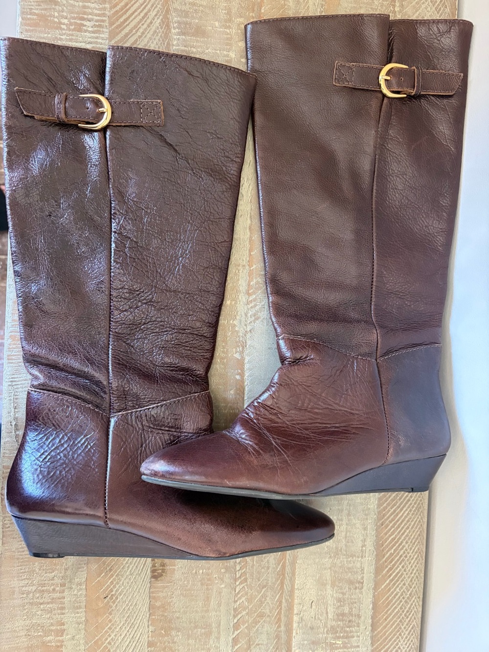 Vintage Women’s Brown Leather Knee-High Boots with Gold Buckle